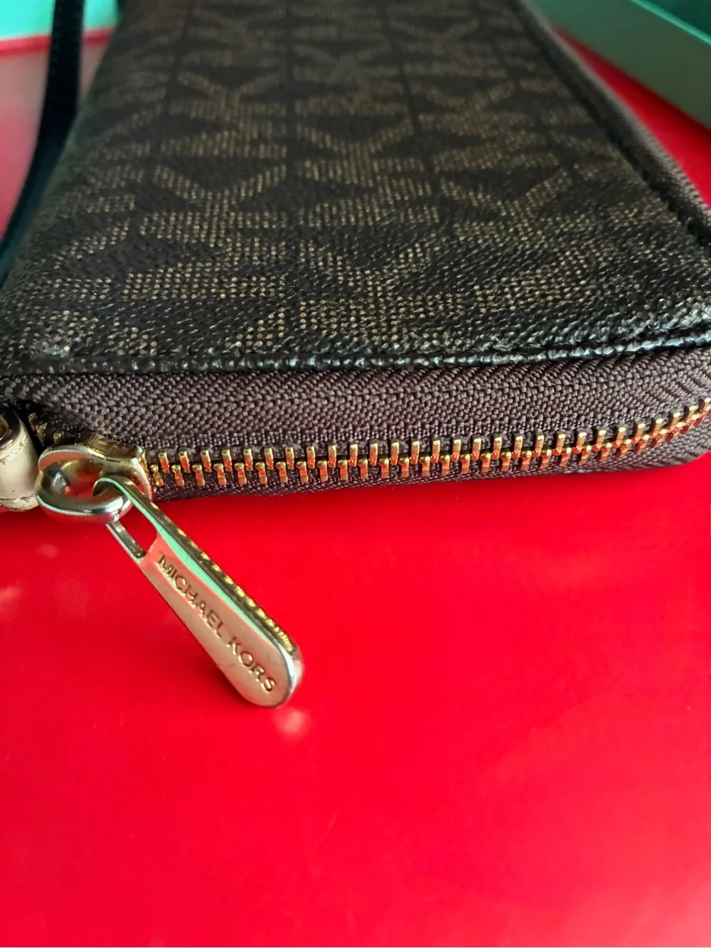 Michael Kors Black and Gold Logo Wristlet